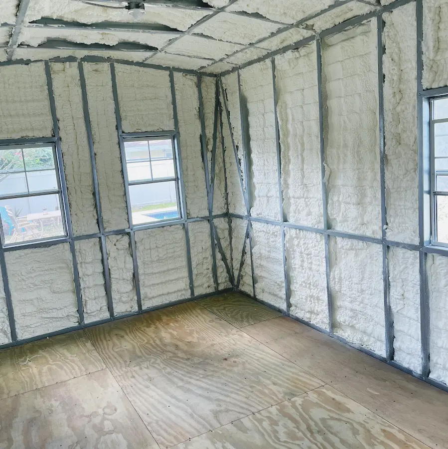Closed-cell spray foam insulation applied to wall cavities in a residential project in Delta